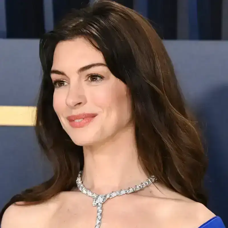 Anne Hathaway Is a Totally New Woman With a Faux Pixie and Dark Makeup