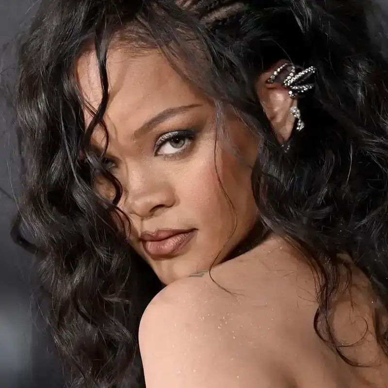 Rihanna's Take on Film Noir Hair Is Equal Parts Curly, Poofy, and Swoopy