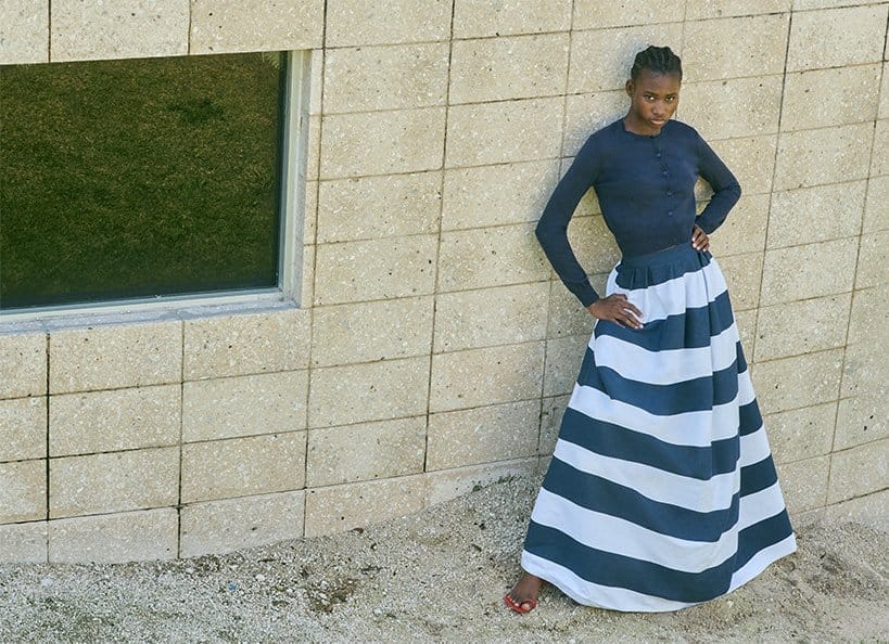 Model wears Silvia Tcherassi - Ananya Abstract Waves Draped Midi Dress