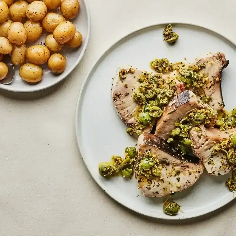 Swordfish Steaks with Olive-Pistachio Sauce and Potatoes