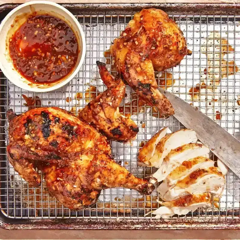 sheet pan with pieces of chicken