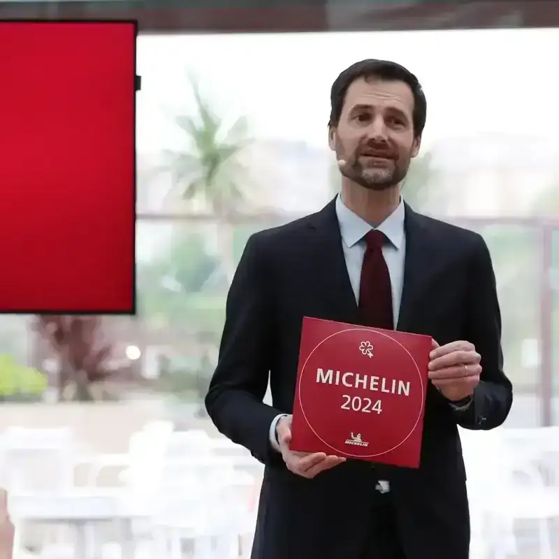 International Director of the Michelin Guides Gwendal Poullennec displays One MICHELIN Key panel during the press conference in Paris, France.