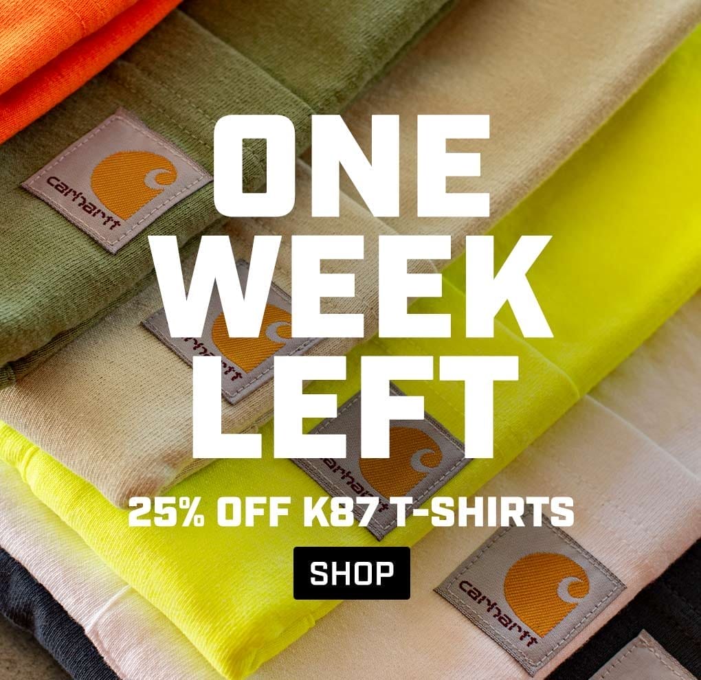 Carhartt pocket t-shirts stacked on top of one another.