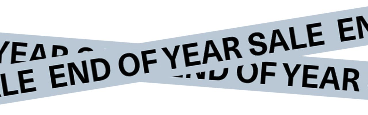 Ribbons that read "end of year sale"