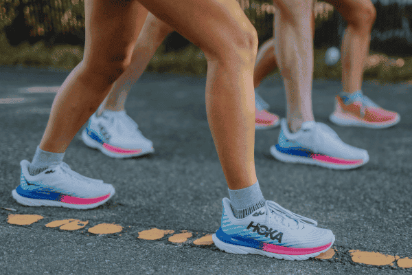 Group of people wearing HOKA Mach 5 shoes