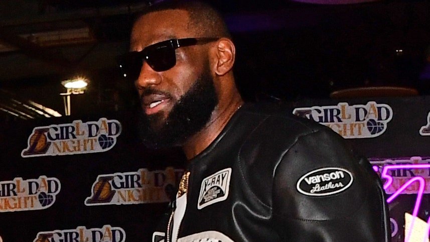 Image may contain: LeBron James, Wristwatch, Arm, Body Part, Person, Clothing, Coat, Jacket, Adult, Accessories, and Glasses