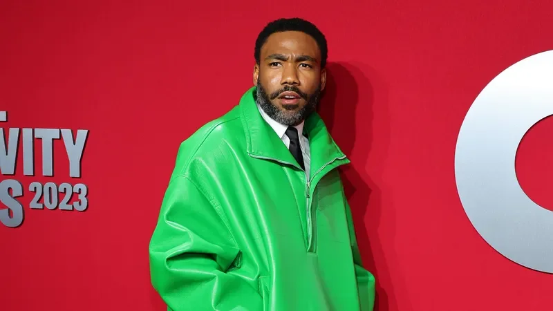 NEW YORK, NEW YORK - APRIL 06: Donald Glover, wearing a fluorescent green Valentino jacket, attends GQ's Global Creativity Awards on April 06, 2023 in New York City. (Photo by Theo Wargo/Getty Images)