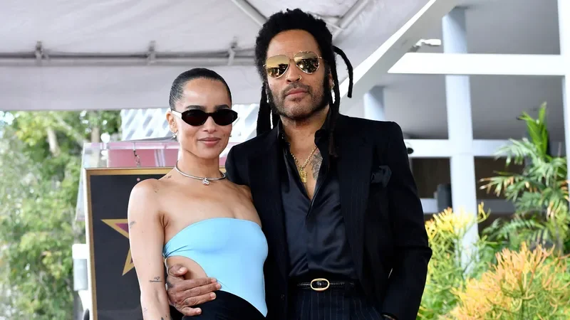 Image may contain: Lenny Kravitz, Zoë Kravitz, Fashion, Accessories, Glasses, Adult, Person, Clothing, and Footwear