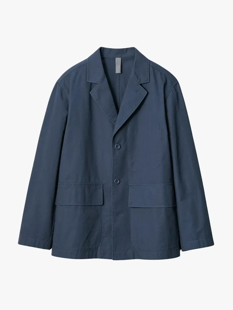Image may contain: Clothing, Coat, Jacket, Blazer, Long Sleeve, Sleeve, and Lab Coat
