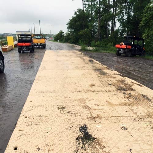 ground protection mat over mud install