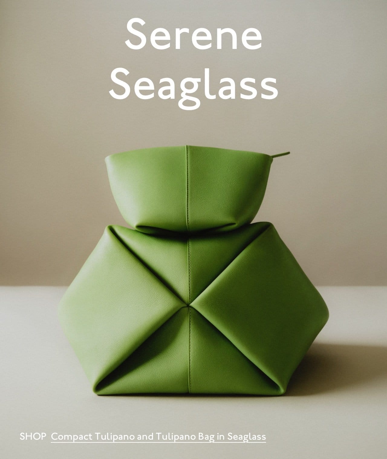Introducing serene Seaglass. Pictured: Compact Tulipano and Tulipano Bag in Seaglass. Shop now.