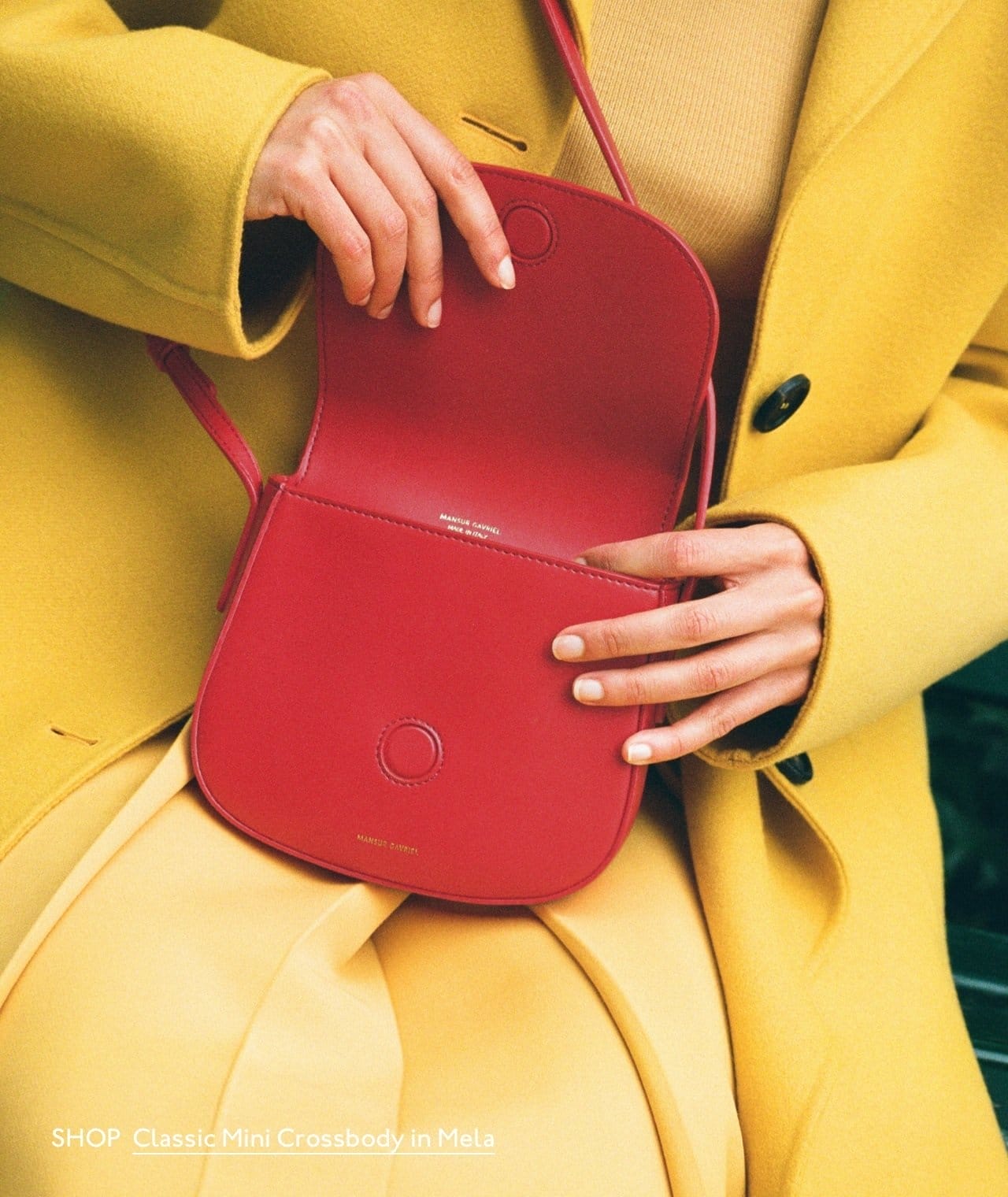 Shop new crossbodies. Pictured: the Vegan Apple Mini Crossbody in Mela, a bright red hue.