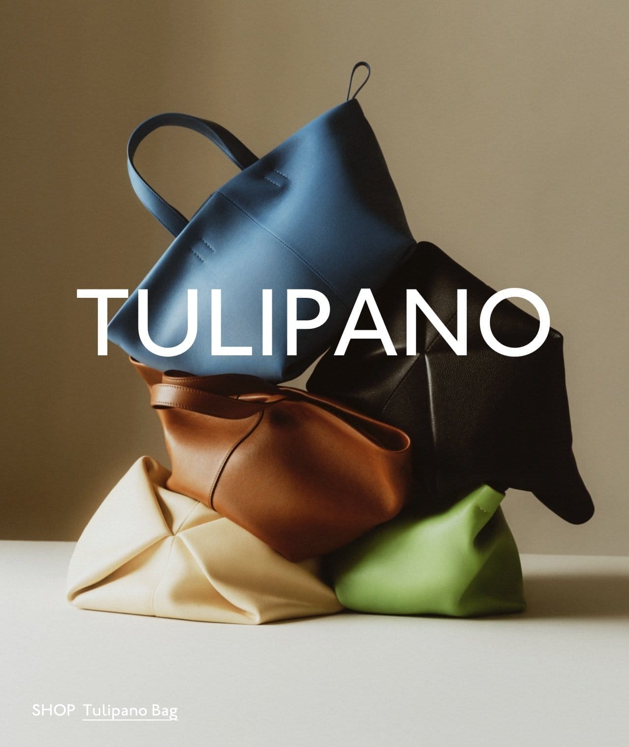 Our Tulipano bag is back. Pictured: the Tulipano Bag in Black, Lago, Avorio, Seaglass and Desert.