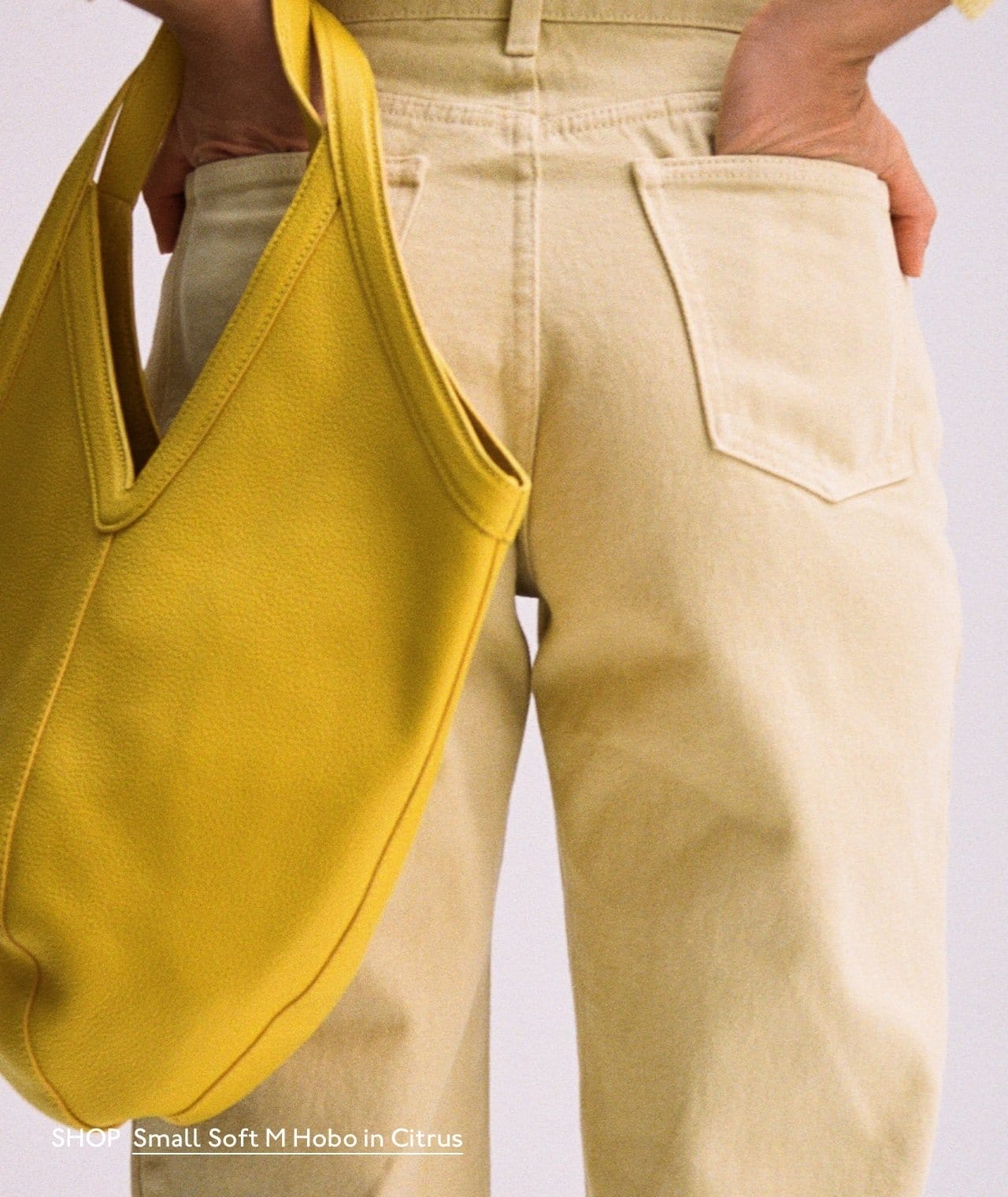 Shop yellows for spring. Pictured: Small Soft M Hobo in Citrus.