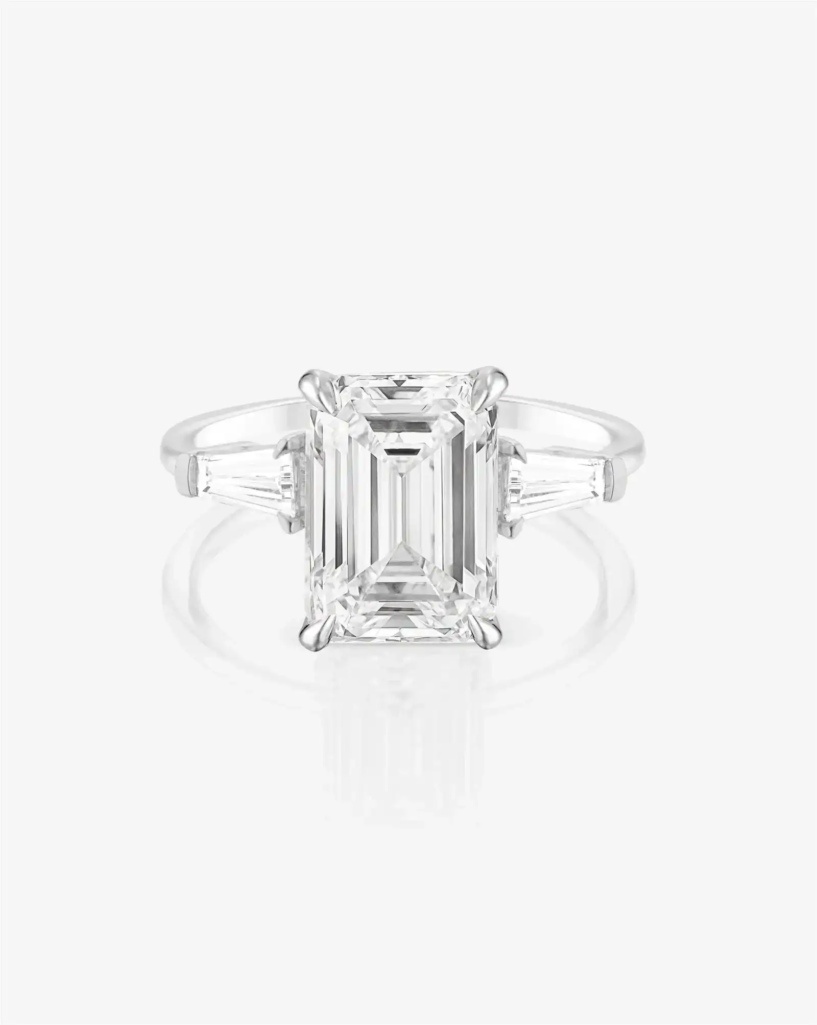 Image of 3.09 Emerald Cut in the Whisper Thin® Three Stone with Tapered Baguettes