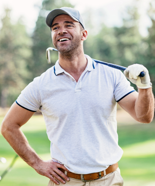 man holding golf club