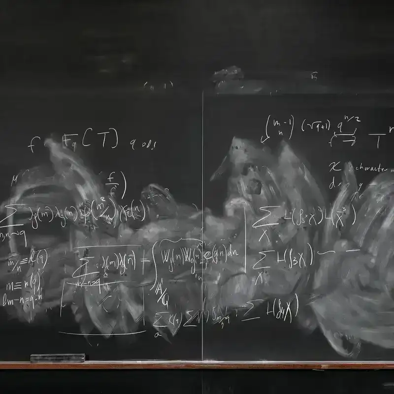A photograph of a mathematicians chalk board. 
