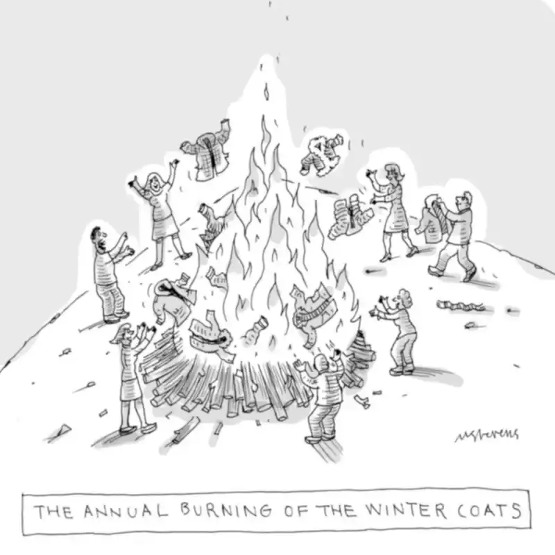 People throw puffy jackets into a bonfire. The caption reads “The Annual Burning of the Winter Coats.”