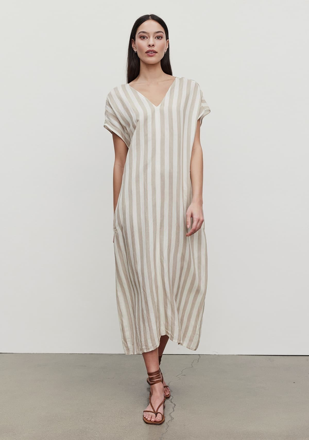 Model wearing the Milla Striped Linen Kaftan Dress