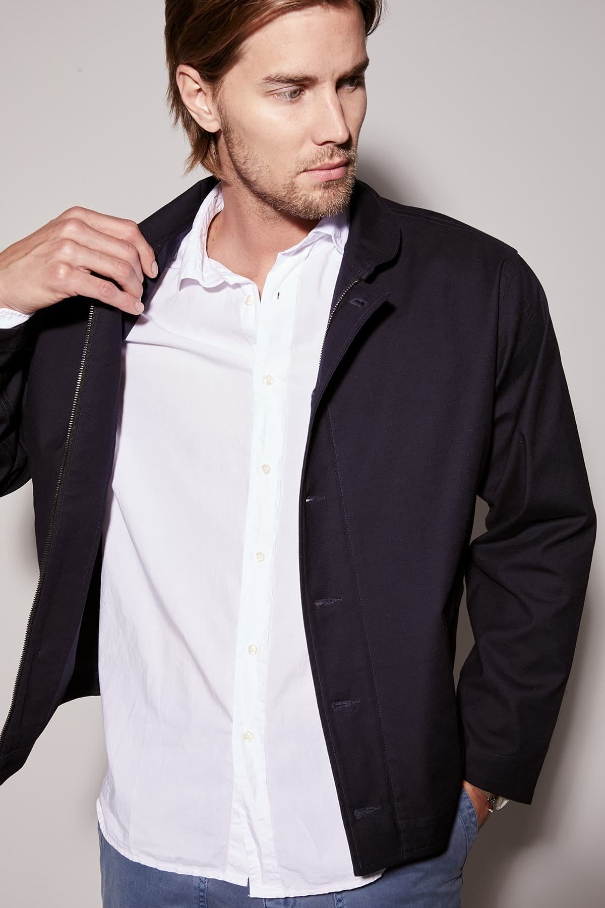 Model wearing the Brooks Button-Up Shirt and Marlon Jacket