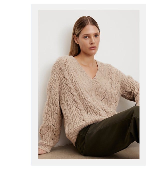 Model wearing the Sade Alpaca Blend V-Neck Sweater