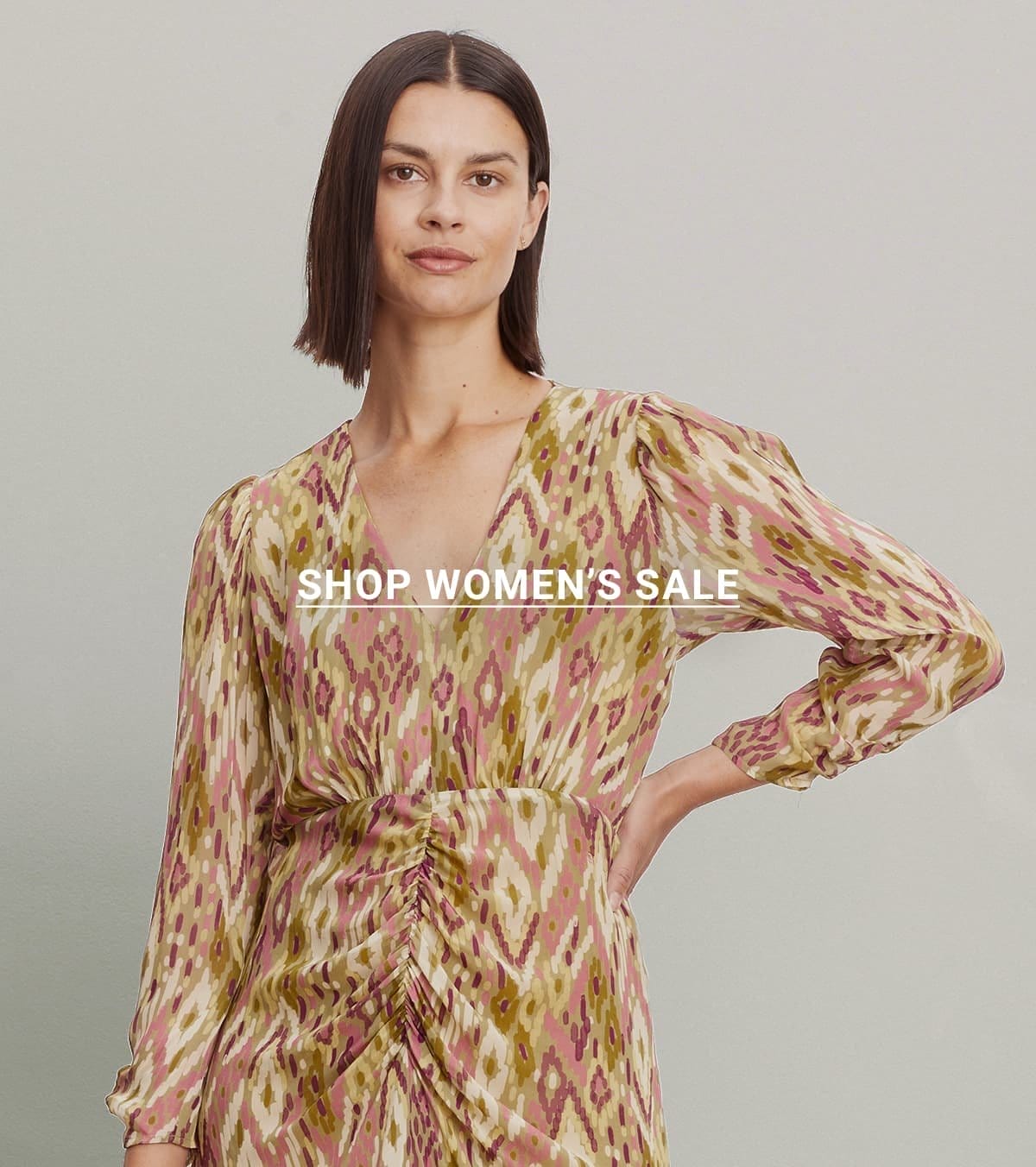 SHOP WOMEN'S SALE. Model wearing the Cailey Printed Dress
