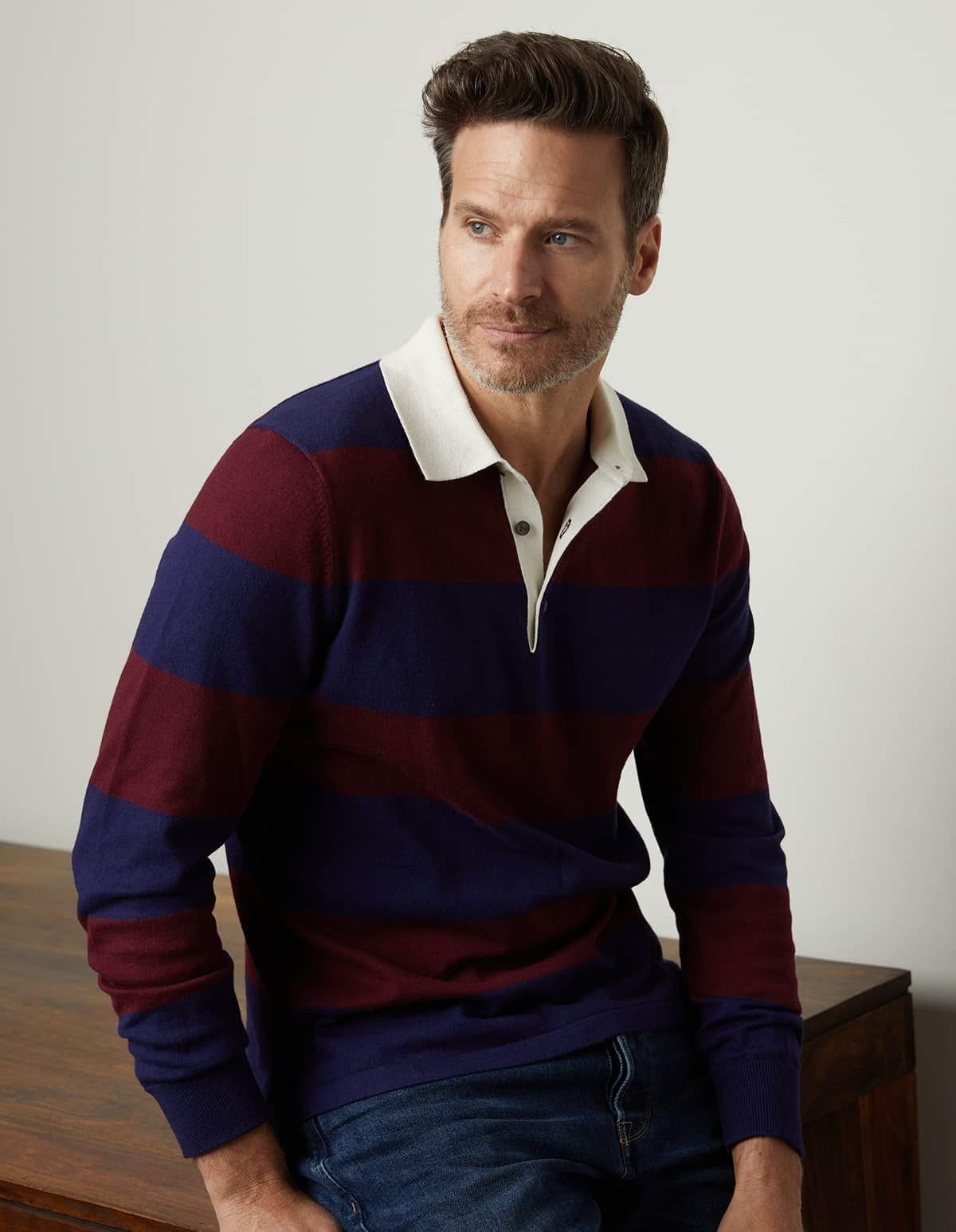 Model wearing the Hastings Striped Polo Sweater